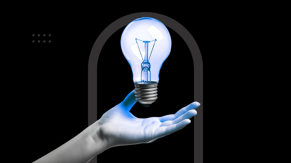 A futuristic digital hand holding a glowing blue lightbulb, symbolizing innovation and creative solutions